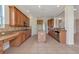 Spacious kitchen featuring granite countertops, stainless appliances and tile flooring at 4307 70Th E Ave, Ellenton, FL 34222