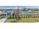 Community pool area with shaded lounging, chairs, and well maintained landscaping for a resort like experience at 4324 112Th E St, Palmetto, FL 34221