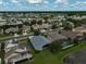 An aerial view of a peaceful residential community with lush landscaping and waterfront homes at 4360 85Th Avenue E Cir, Parrish, FL 34219
