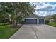 Charming single-story home featuring a well-manicured lawn and a two-car garage at 4360 85Th Avenue E Cir, Parrish, FL 34219