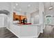 Open kitchen featuring granite countertops, breakfast bar, stainless appliances, and wood cabinets at 4360 85Th Avenue E Cir, Parrish, FL 34219