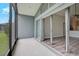 Screened patio offers seamless indoor/outdoor living with sliding glass doors at 4360 85Th Avenue E Cir, Parrish, FL 34219