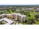 Wide aerial shot showcasing a lush golf course and residences at 4460 Fairways Blvd # 607, Bradenton, FL 34209