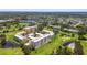 Expansive aerial view capturing the golf course community, residences, and surrounding landscape at 4460 Fairways Blvd # 607, Bradenton, FL 34209