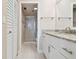 Bathroom boasts granite countertops, a large mirror, and a glass-enclosed shower at 4460 Fairways Blvd # 607, Bradenton, FL 34209