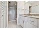 Bathroom boasts granite countertops, a large mirror, and a glass-enclosed shower at 4460 Fairways Blvd # 607, Bradenton, FL 34209