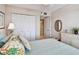 Well-lit bedroom with closet, ceiling fan and stylish furnishings at 4460 Fairways Blvd # 607, Bradenton, FL 34209