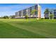 Exterior of building showing the building's windows and golf course at 4460 Fairways Blvd # 607, Bradenton, FL 34209