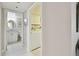 Hallway leading to the bathroom and laundry room at 4460 Fairways Blvd # 607, Bradenton, FL 34209