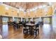 Spacious community room featuring elegant lighting, wood floors, and comfortable seating at 4460 Fairways Blvd # 607, Bradenton, FL 34209