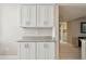 Close-up of the kitchen cabinets and countertops, showcasing clean design and finishes at 4460 Fairways Blvd # 607, Bradenton, FL 34209