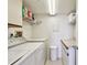 Bright laundry area with a full size washer and dryer at 4460 Fairways Blvd # 607, Bradenton, FL 34209