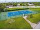 Well-maintained tennis court with green and blue surface, ready for friendly matches at 4460 Fairways Blvd # 607, Bradenton, FL 34209