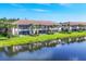 Beautiful lakefront condos with well-maintained lawns and mature trees at 4487 Cinnamon Dr # 2604, Sarasota, FL 34238