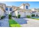 Well maintained townhouse featuring a private gated entrance, paver driveway, and two car garage at 4487 Cinnamon Dr # 2604, Sarasota, FL 34238