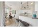 Eat-in kitchen featuring granite counters, stainless steel appliances, and stylish lighting at 4487 Cinnamon Dr # 2604, Sarasota, FL 34238