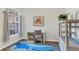 Cozy office space filled with natural light, a desk, and decorative touches at 4487 Cinnamon Dr # 2604, Sarasota, FL 34238