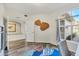 Bright office with a view, featuring wood floors and stylish decor at 4487 Cinnamon Dr # 2604, Sarasota, FL 34238
