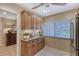 Kitchen features custom cabinetry, granite countertops, and lots of storage space at 4555 Chandlers Forde # 47, Sarasota, FL 34235