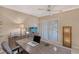 Nicely decorated home office featuring a ceiling fan, louvred doors and a stylish lamp at 4555 Chandlers Forde # 47, Sarasota, FL 34235