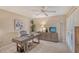 Bright office space featuring a ceiling fan, built-in shelving, and a spacious wooden desk at 4555 Chandlers Forde # 47, Sarasota, FL 34235