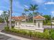 Welcome to Venice Woodlands community sign with beautiful landscaping at 460 Daylily Blvd, Nokomis, FL 34275
