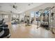 Fitness center with modern equipment, large windows and natural light at 460 Daylily Blvd, Nokomis, FL 34275