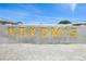 Community sign that says Nokomis in yellow lettering at 460 Daylily Blvd, Nokomis, FL 34275