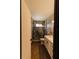 Modern bathroom featuring a glass-enclosed shower and a vanity with sink at 4945 Camphor Ave, Sarasota, FL 34231