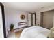 Inviting bedroom with a decorative mirror, stylish console, and modern accents at 4945 Camphor Ave, Sarasota, FL 34231