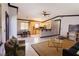 Comfortable living room with an open floor plan, showcasing the kitchen and dining area at 4945 Camphor Ave, Sarasota, FL 34231