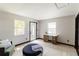 Bright and airy living space with large windows and neutral tones at 4945 Camphor Ave, Sarasota, FL 34231