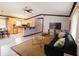 Open-concept living space featuring a stylish living room and adjacent kitchen at 4945 Camphor Ave, Sarasota, FL 34231