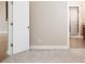 Bedroom interior with open doorway to bathroom and view of carpet at 4949 Savona Run, Bradenton, FL 34211