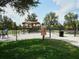 Dog park amenities include shaded benches and secure fencing for a safe and enjoyable experience for pets at 4949 Savona Run, Bradenton, FL 34211