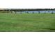 Perfect your swing at the driving range located in the community near a lake and beautifully landscaped homes at 4949 Savona Run, Bradenton, FL 34211