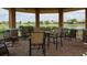 Lakeside gazebo featuring comfortable seating and beautiful waterfront views for relaxation or gatherings at 4949 Savona Run, Bradenton, FL 34211