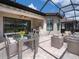 Outdoor living space with a full outdoor kitchen, dining and seating area at 4949 Savona Run, Bradenton, FL 34211