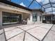 Outdoor living space with a full outdoor kitchen and dining area at 4949 Savona Run, Bradenton, FL 34211