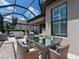 Screened in lanai, with exterior dining and seating. A great space for entertaining at 4949 Savona Run, Bradenton, FL 34211