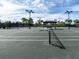 Well-maintained tennis court at Esplanade Golf & Country Club, featuring professional surfacing and lighting at 4949 Savona Run, Bradenton, FL 34211