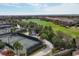 Aerial view of tennis courts, golf course and walking paths showcasing the active lifestyle at 5117 Serata Dr, Bradenton, FL 34211