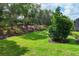 The backyard boasts a well-maintained lawn and garden for serene outdoor living at 5117 Serata Dr, Bradenton, FL 34211