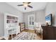 Versatile room with built-in shelving, a desk, and a chair, perfect for a home office or study at 5117 Serata Dr, Bradenton, FL 34211