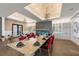 This dining room features modern decor, designer lighting, and fireplace for an inviting space at 5117 Serata Dr, Bradenton, FL 34211