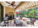 The screened patio with seating offers a relaxing outdoor retreat, perfect for gatherings and relaxation at 5117 Serata Dr, Bradenton, FL 34211