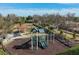 Community playground with slides, climbing equipment, a gazebo, and picnic tables for Gathering fun at 5117 Serata Dr, Bradenton, FL 34211