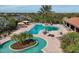 Resort-style pool area featuring a lazy river, pool, hot tub, cabanas, and ample seating for relaxation at 5117 Serata Dr, Bradenton, FL 34211