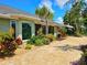 Enjoy outdoor living with this home's brick paved patio and well-manicured landscaping at 5207 86Th Street W Ct, Bradenton, FL 34210