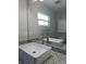 Bathroom vanity features granite counters, a square sink, and a mirror above at 5207 86Th Street W Ct, Bradenton, FL 34210